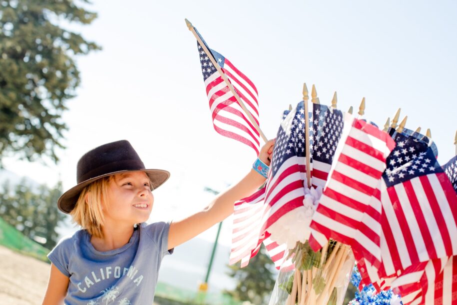 Kid Holding USA Flag 4th of July Independence Day